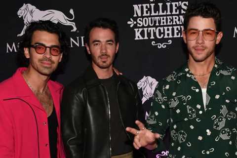 Joe, Kevin and Nick Jonas celebrate the grand opening of the new family restaurant in Las Vegas!